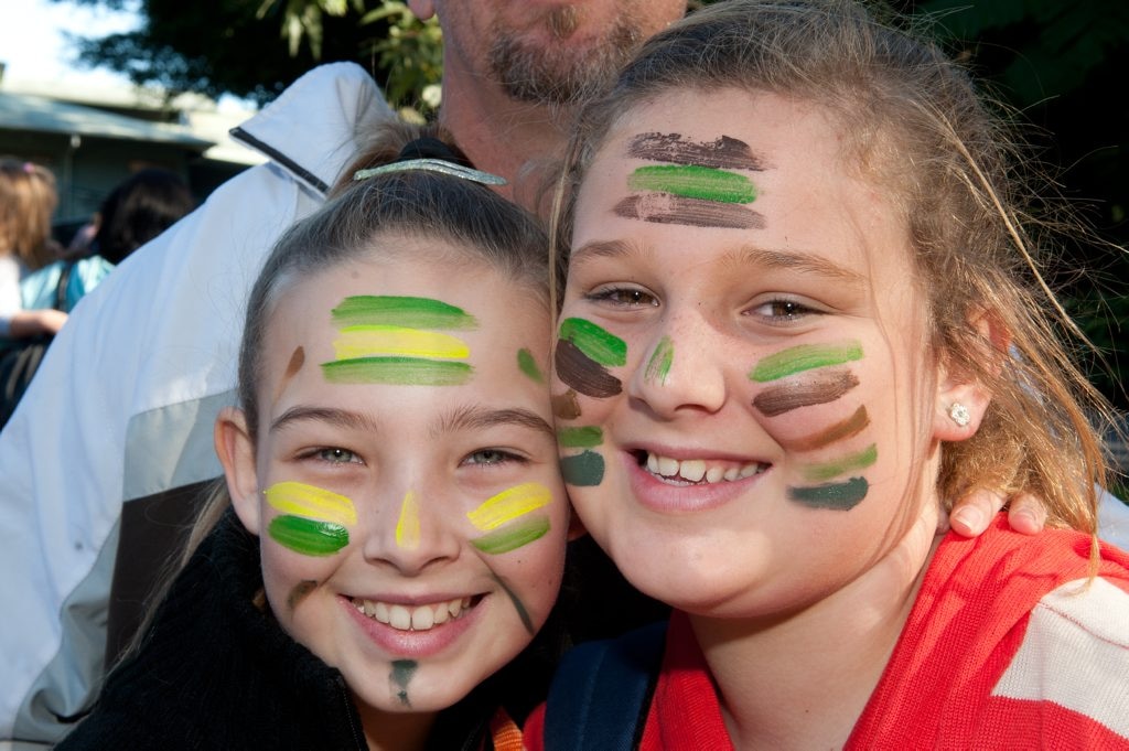 Chloe and Alanah paint their faces for Bindi Irwin's 14th birthday party at Australia Zoo. Picture: Warren Lynam