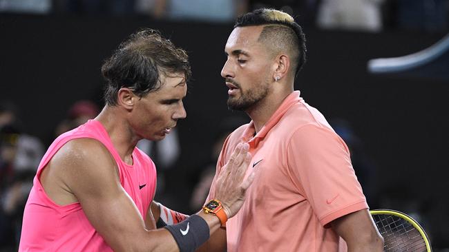 Rafael Nadal (L) and Nick Kyrgios congratulate each other after the match. Picture: AP/Andy Brownbill