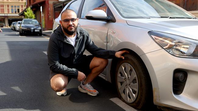 Darshil Patel had his tyres slashed in Coglin Street, in the city. Picture: Kelly Barnes