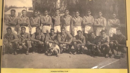 The 1947 Pioneer premiership side. William Cole is fifth from the left in the back row.