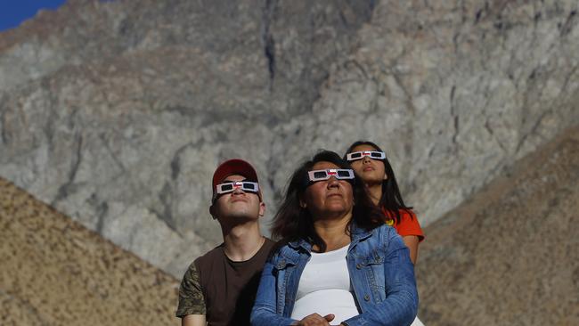 Chileans await the eclipse in Paiguano yesterday. Picture: Getty Images