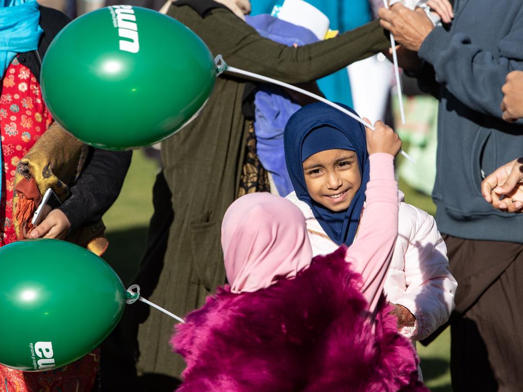 Young girls enjoy Eid al-Adha celebrations at Roberts Park, Greenacre. Picture: Julian Andrews. Photos can be purchased at newsphotos.com.au