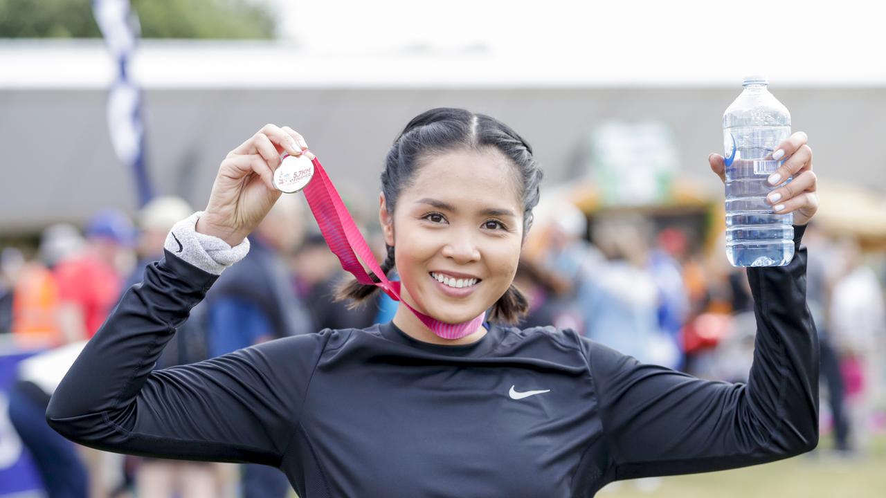 Nattida Koyfong, 29, from Thailand at the finish the Gold Coast Airport Fun Run. Picture: Tim Marsden.