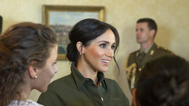 Meghan chats with guests at a reception held by the Governor General at Admiralty House in Sydney this afternoon. Picture: Steve Christo/AP