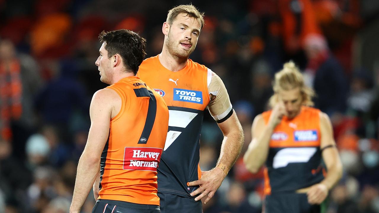 Matt Flynn and Lachie Ash show their frustration after another loss.