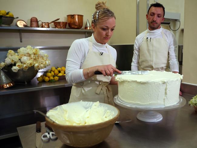 Preparation of the wedding cake is underway. Picture: AFP