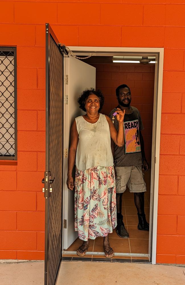 Stella and her son Terrance in front of a new Galiwinku home.