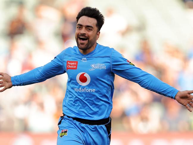 ADELAIDE, AUSTRALIA - JANUARY 11: Rashid Khan of the Strikers celebrates after taking a wicket during the Big Bash League match between the Adelaide Strikers and the Melbourne Stars at Adelaide Oval, on January 11, 2021, in Adelaide, Australia. (Photo by Daniel Kalisz/Getty Images)