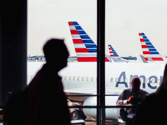 A man was barred from exiting a plane after taking a single photo.