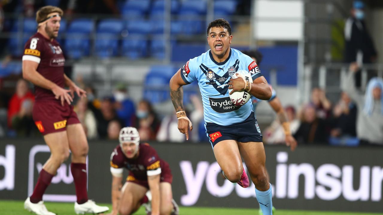 GOLD COAST, AUSTRALIA - JULY 14: Latrell Mitchell of the Blues scores a try during game three of the 2021 State of Origin Series between the New South Wales Blues and the Queensland Maroons at Cbus Super Stadium on July 14, 2021 in Gold Coast, Australia. (Photo by Chris Hyde/Getty Images)