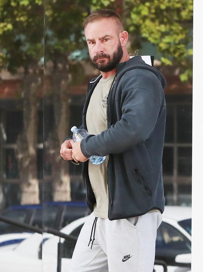 Molloy arriving at an earlier court appearance. (AAP Image/Sue Graham)