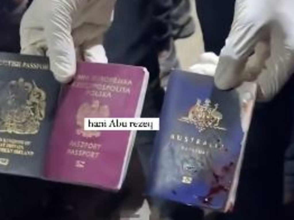 A bloodstained Australian passport was found alongside one of the bodies.