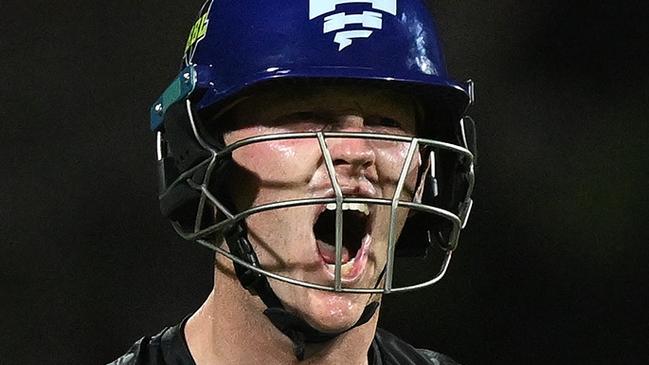 HOBART, AUSTRALIA - JANUARY 27: Mitch Owen of the Hurricanes celebrates scoring a century during the BBL The Final match between Hobart Hurricanes and Sydney Thunder at Ninja Stadium on January 27, 2025 in Hobart, Australia. (Photo by Steve Bell/Getty Images)