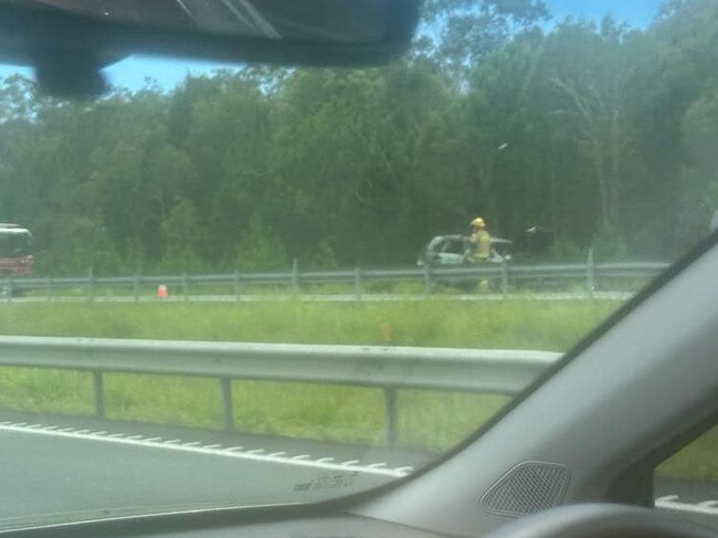 Traffic was at a standstill after a vehicle caught fire in Coochin Creek on the Bruce Hwy Sunday morning. Photo: Carlie Walker.