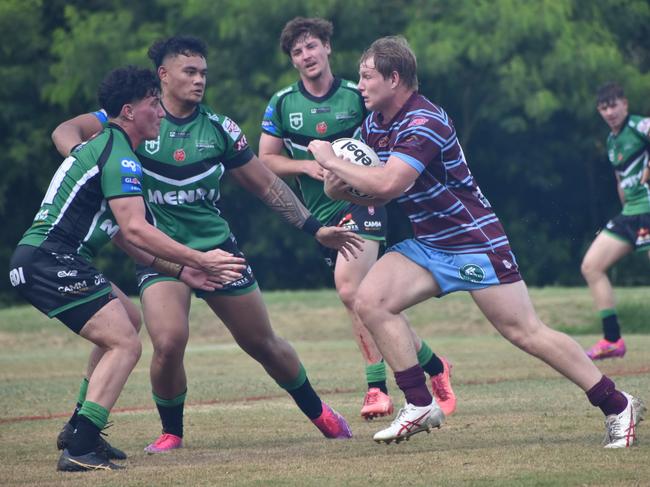 CQ Capras under-19 forward Josh Nilon charges into Townsville's defensive line.