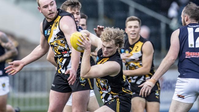 Tigers Riley Ashlin tops the pack to come away with the mark. Picture: Eddie Safarik