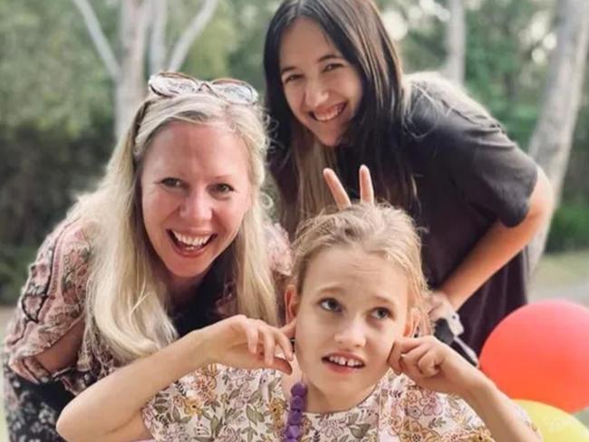 Marie-Louise Willis with her daughters Ash and Amy.