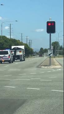 Man boards moving truck in failed bid to evade Townsville police