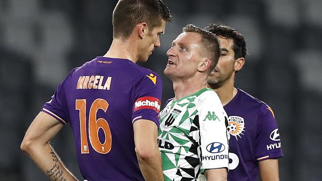 United striker Besart Berisha has words with Perth’s Tomislav Mrcela during their match this week. Picture: Getty Images