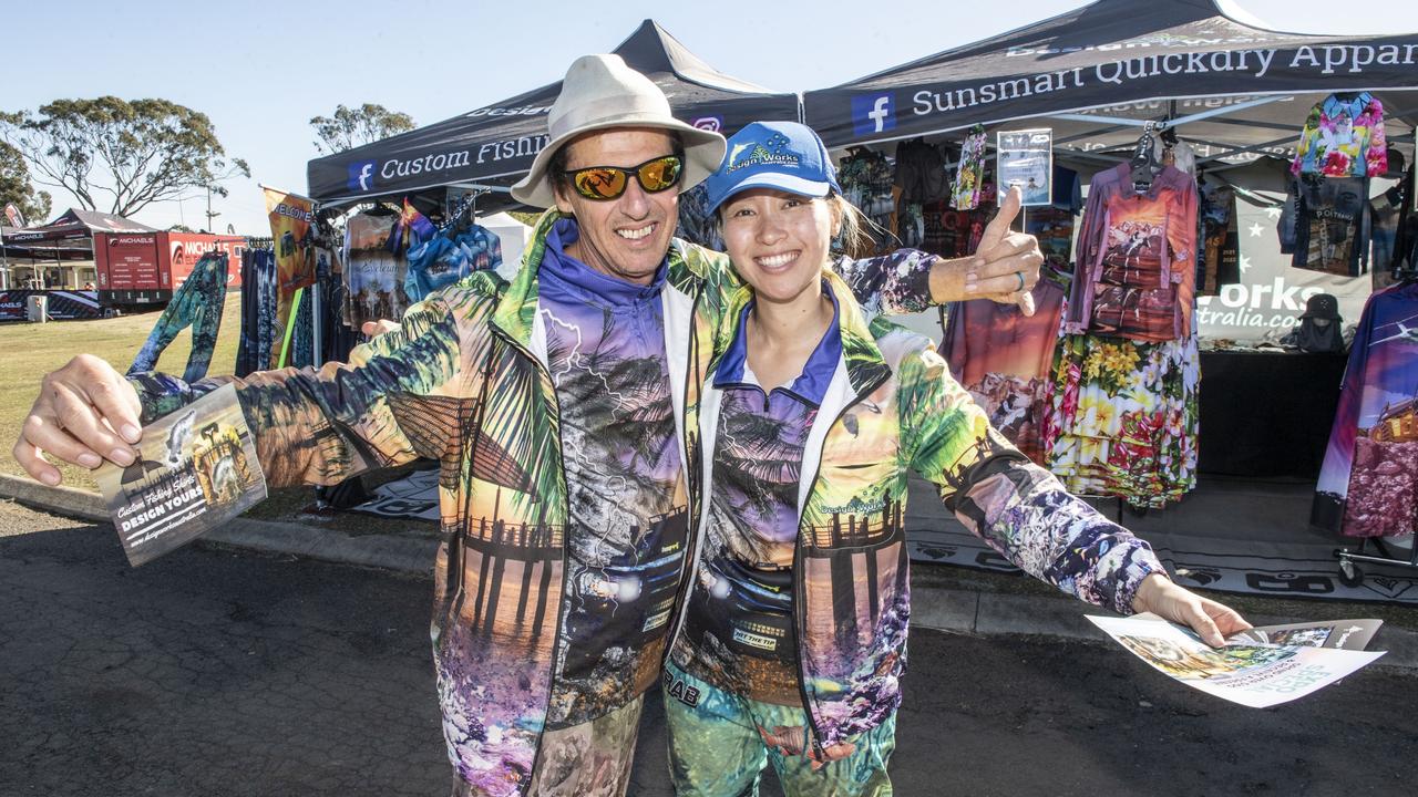 David Roggerow and Dahe Wie from Design Works Apparel wearing their custom fishing suits at the Queensland Outdoor Adventure Expo, Toowoomba Showgrounds. Friday, July 29, 2022. Picture: Nev Madsen.