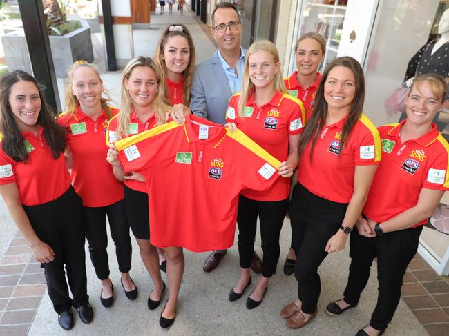 Harbour Town Centre Manager Greg Day announces their sponsorship for the Gold Coast Suns AFLW team and then shows the team around. Pictured from left is Cheyenne Hammond, Georgia Breward, Dee Heslop, Alexia Hamilton, Serene Watson, Hannah Dunn, Jade Pregelj and Brittany Perry. Picture: Glenn Hampson.