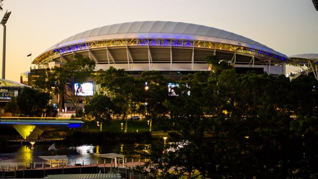 Adelaide Oval lit up in blue and yellow, in solidarity with Ukraine. Picture: Morgan Sette