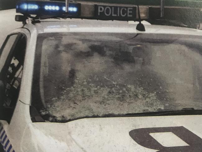 The damaged windscreen of the NSW police paddy wagon after being shot at by Warner.