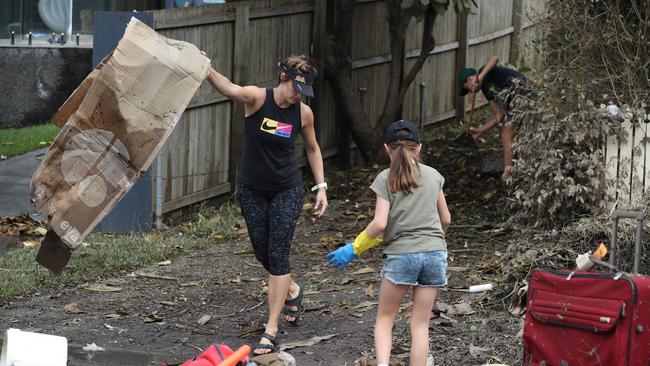 Cleaning up in Vincent St, Auchenflower. Picture: Annette Dew