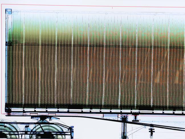 An X-ray screening of a container truck finds thousands of illegal cigarette packets. Picture: David Caird