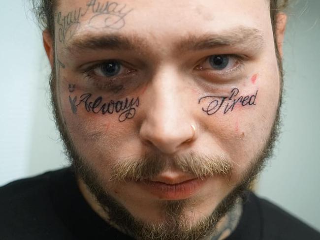 Singer With Tattoos On His Face