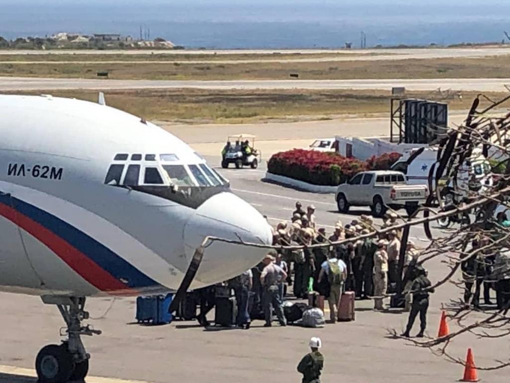 Russian troops are seen disembarking from a transport plane outside Caracas, Venezuela. Picture via Federico Black B