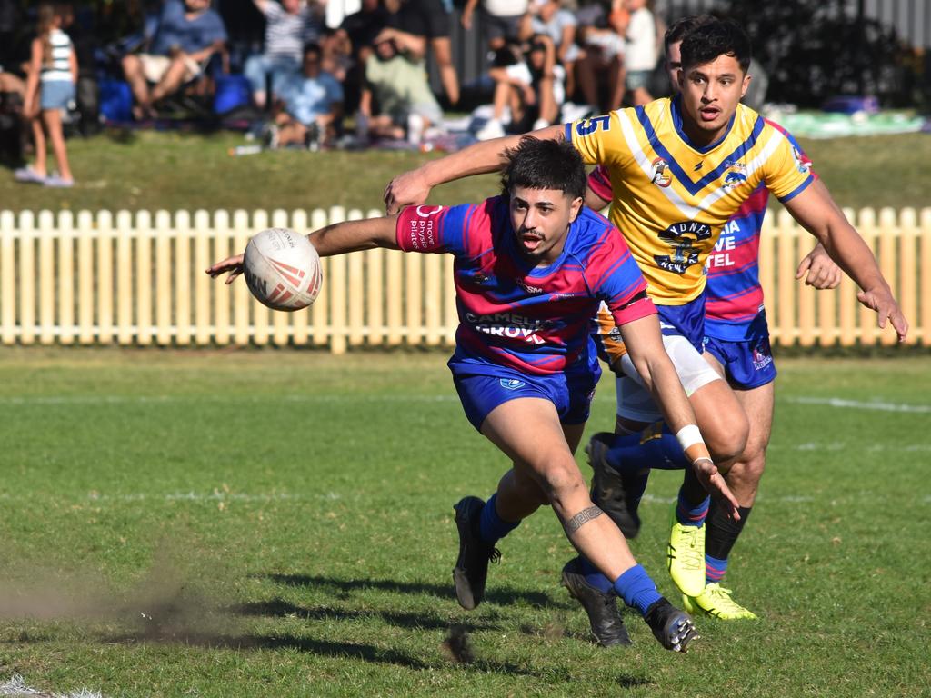 Chaise Robinson tries to get on the ball with Joshua Rudolph approaching. Picture: Sean Teuma