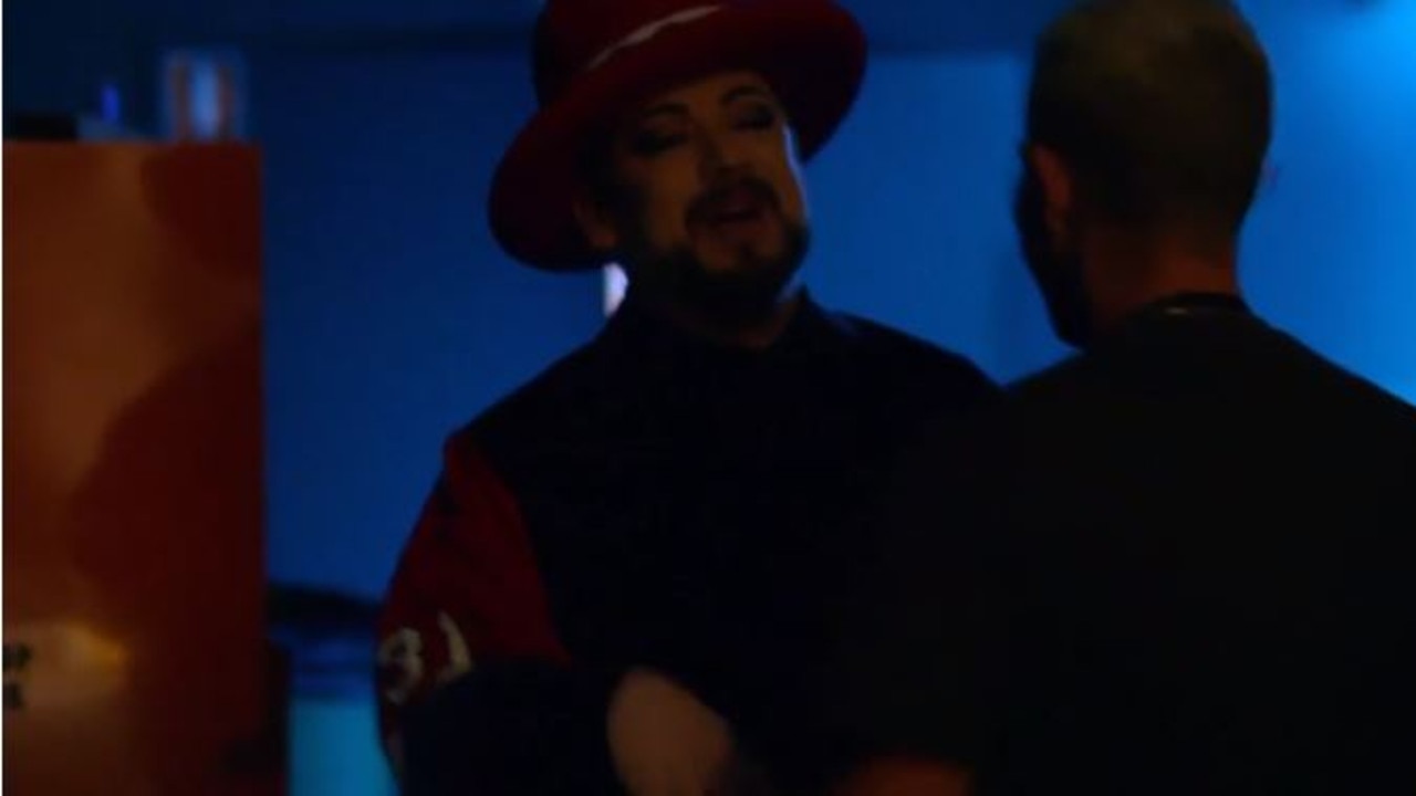 Backstage a calmer Boy George admitted he “misheard” the contestant’s comments