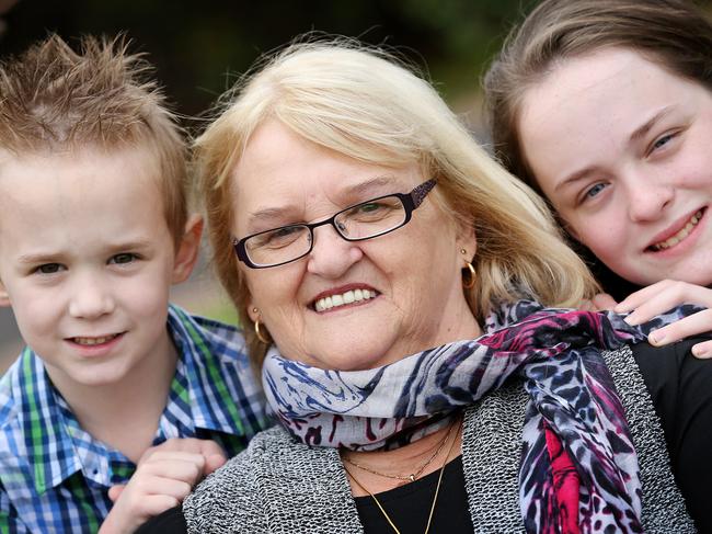 DI Potter, the widow of Fiskville whistle blower Brian Potter, has been nominated for a Pride of Australia award. Di Potter gave evidence to a parliamentary inquiry last month where she revealed the heartache she felt after losing her husband and the anger at the CFA who did nothing to warn fire fighters of the dangers. Di is pictured with two of her grandchildren, Noah, 6, and Mia, 12. Picture: Mark Stewart