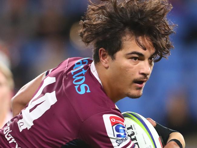 GOLD COAST, AUSTRALIA - AUGUST 21: Jordan Petaia of the Reds is tackled during the round eight Super Rugby AU match between the Western Force and the Queensland Reds at Cbus Super Stadium on August 21, 2020 in Gold Coast, Australia. (Photo by Chris Hyde/Getty Images)