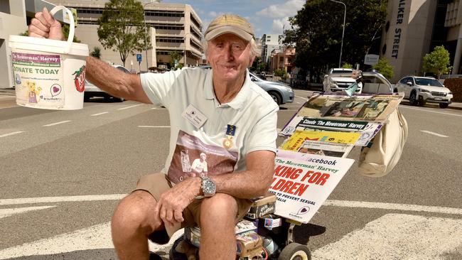 Claude Harvey with his trustry mower. Picture: Evan Morgan