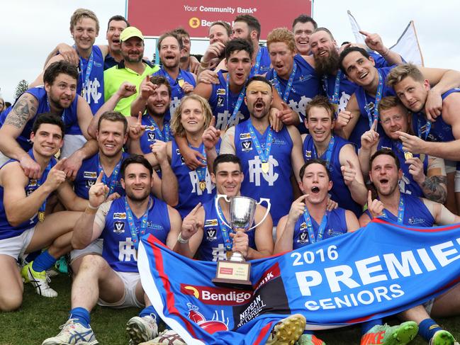 Hastings players celebrate with the premiership cup during the Nepean FL Grand Final between the Frankston Bombers and Hastings played in Frankston on Saturday 10th September, 2016. Picture: Mark Dadswell