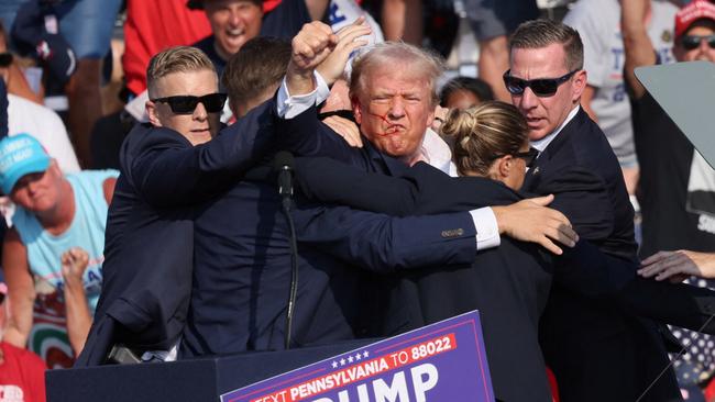 Republican presidential candidate and former US President Donald Trump gestures to supporters following the assassination attempt. Picture: Reuters