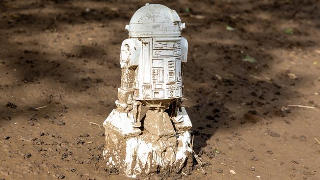 An R2D2 statue has washed up to Reg Harris’ Wingham home. Picture: Thomas Lisson