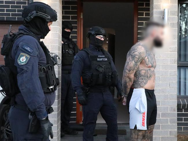 A group were arrested by NSW Police after two men were allegedly shot in Claymore.