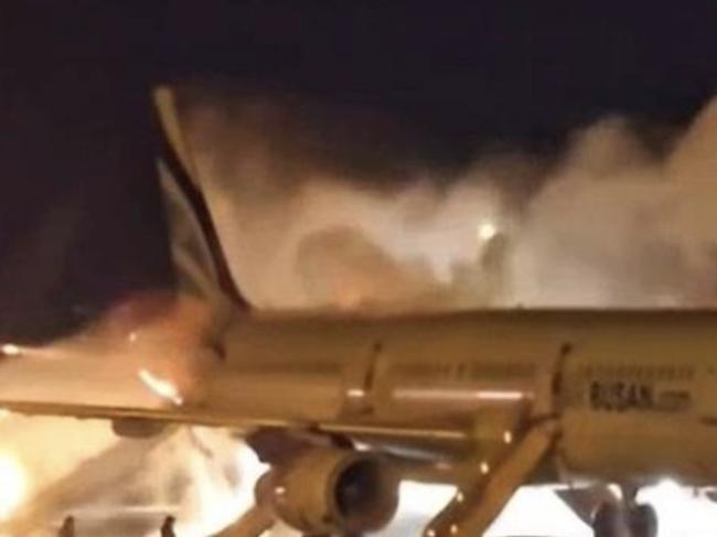 Terrifying moment fire erupts on plane before takeoff