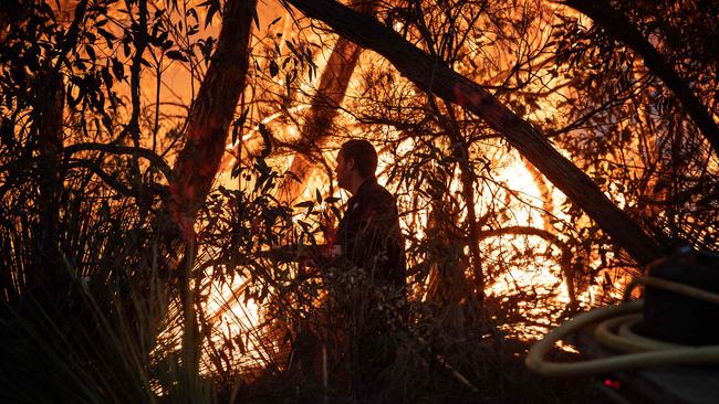 A fire fighter battles bushfires on Kangaroo Island PICTURE: Brad Fleet