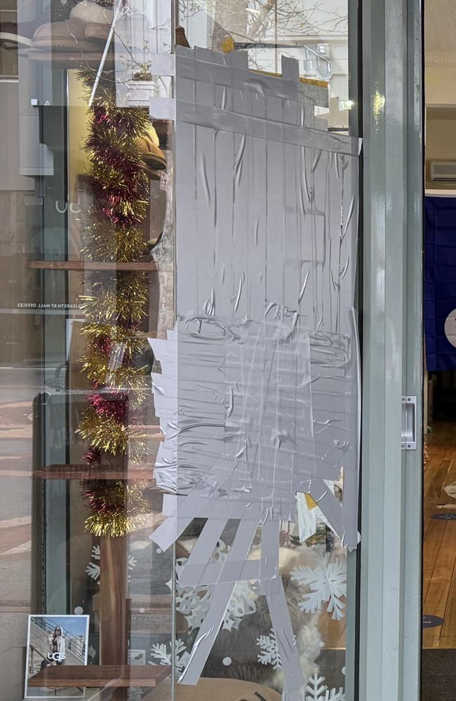 Smashed window of store in the Elizabeth Street Mall. Picture: Nikki Davis-Jones