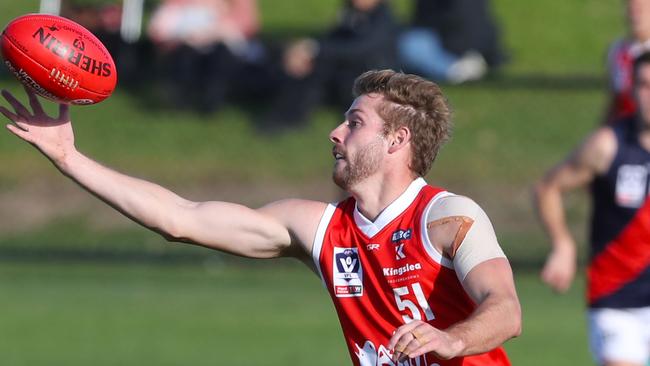 Alex Johnson gathers possession on his VFL debut for Northern Blues. Picture: David Crosling.