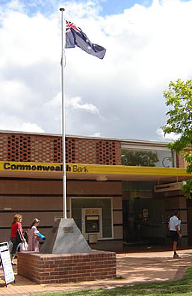 The war memorial and flag pole at The Centre shopping precinct in Forestville. Picture: NSW War Memorials Register