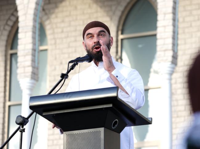 Sheikh Wesam Charkawi addresses the crowd -  Ahmad Hraichie  addresses the crowd at a  Hizb ut-Tahrir hosting a rally outside Lakemba Mosque on Monday afternoon, on the anniversary of the October 7 attacks. Jane Dempster/The Australian.