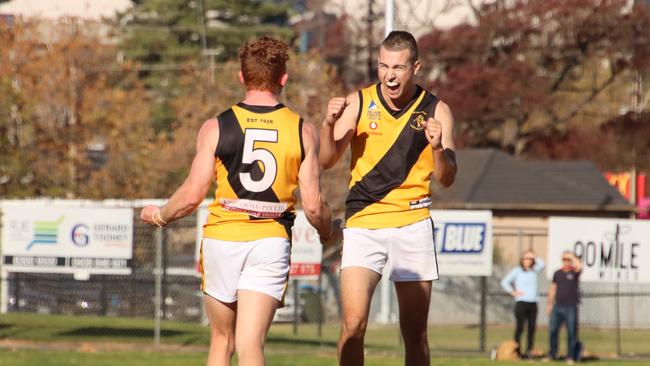 Jack Sausse (left) celebrates a goal with Jake Hodby during Broadview's win over PHOS Camden. Picture: Matt Oborn