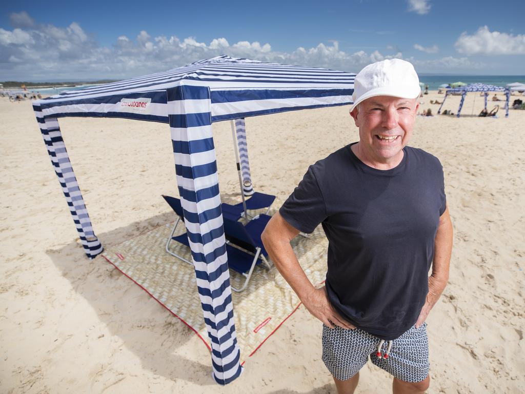 QLD architect Mark Fraser who created the Cool Cabana beach umbrella on Noosa Main Beach. Picture Lachie Millard