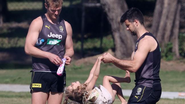 Trent Cotchin with his oldest daughter at training. Pic: Michael Klein