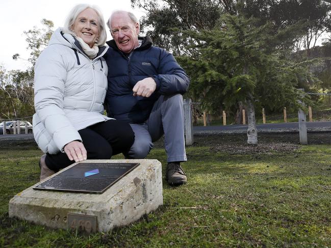 Mick and Sue Hawkins next to the memorial plaque for Private William Cuthbert Hawkins at the Soldiers’ Memorial Avenue on the Queen’s Domain in Hobart. Picture: CHRIS KIDD